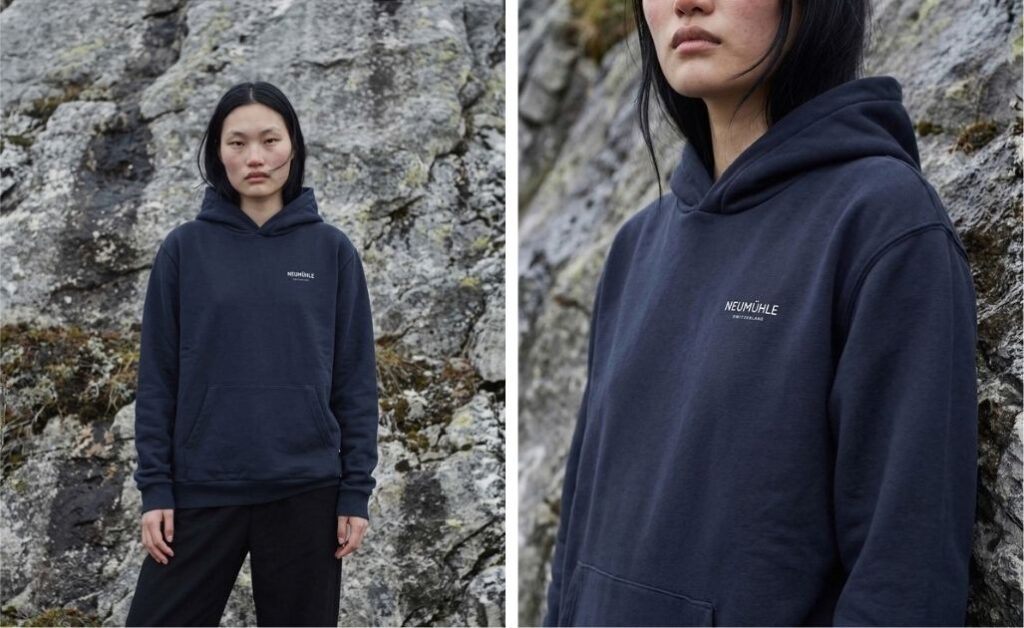NEUMÜHLE Circular Mono Hoodie monomaterial organic‑cotton hoodie outdoor model shot
