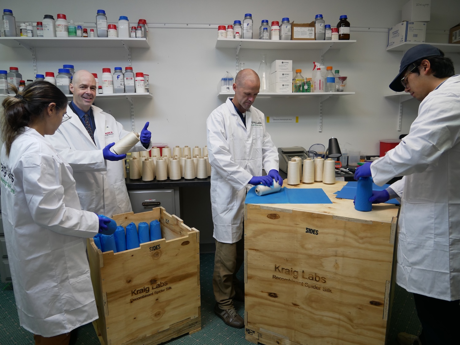 Kraig Labs lab team packaging first commercial recombinant spider silk yarn shipment